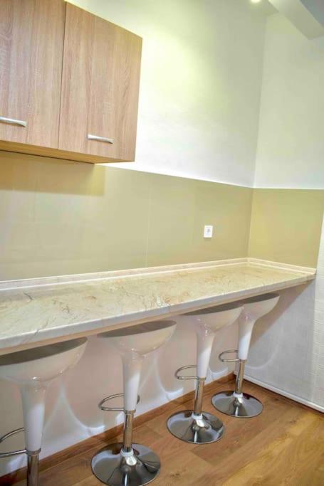 Kuchyň nebo kuchyňský kout v ubytování Metaxa apartment