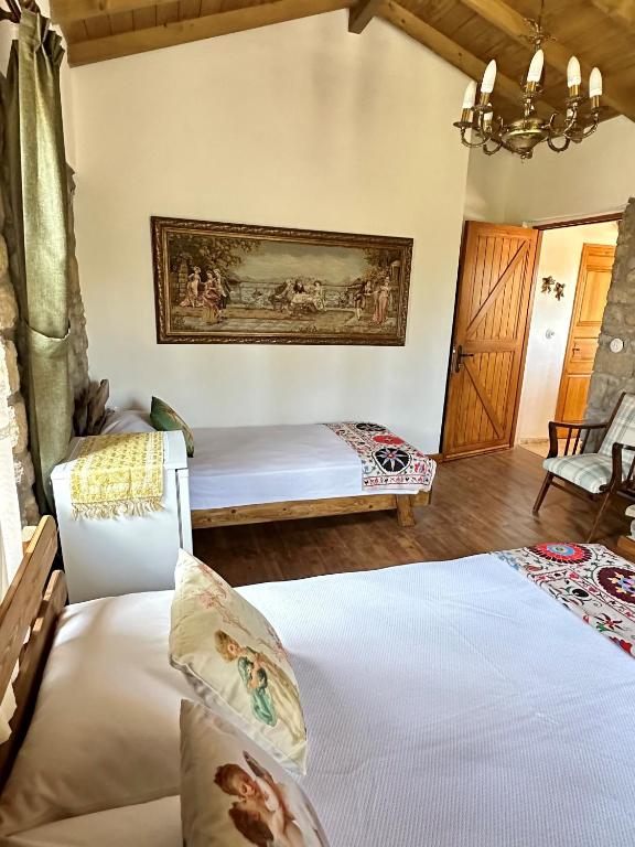 Postel nebo postele na pokoji v ubytování Ilios Guest House