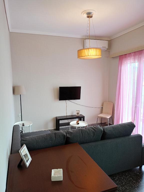 TV a/nebo společenská místnost v ubytování Serenity Apartment