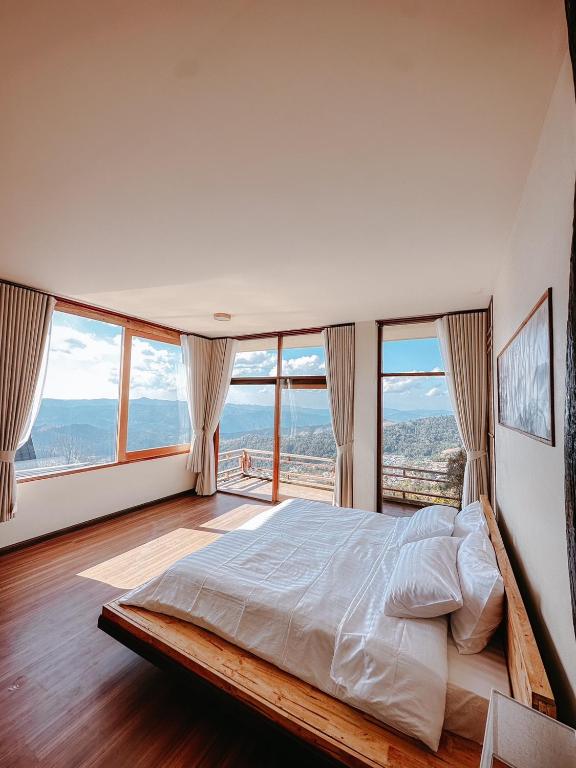 Postel nebo postele na pokoji v ubytování Doichang view-Sunset room