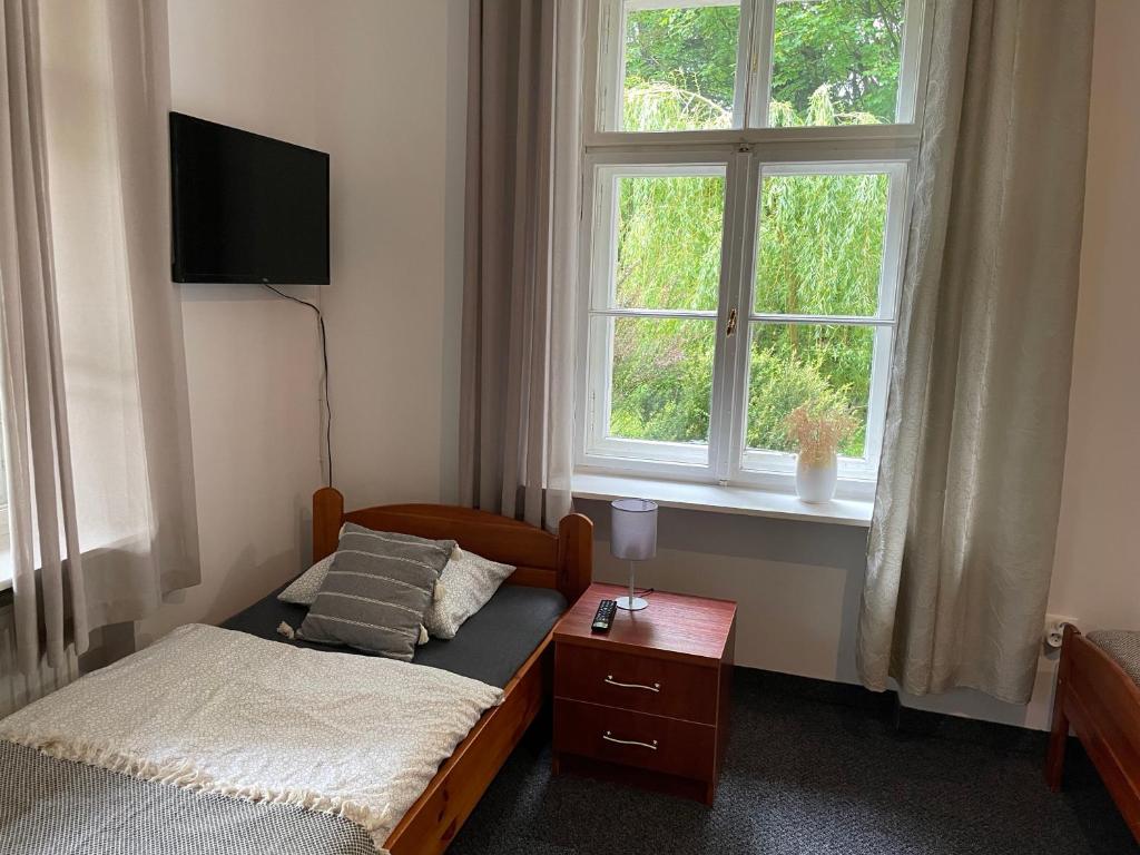 Postel nebo postele na pokoji v ubytování Villa Brzozowy Gaj