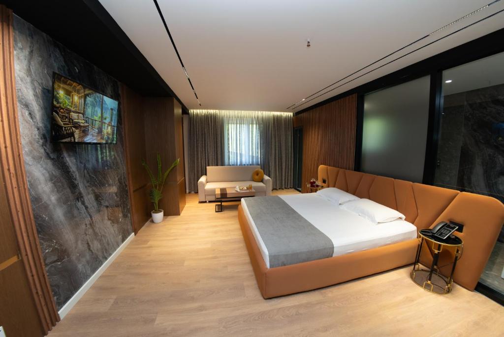 Postel nebo postele na pokoji v ubytování Hotel Monopoly
