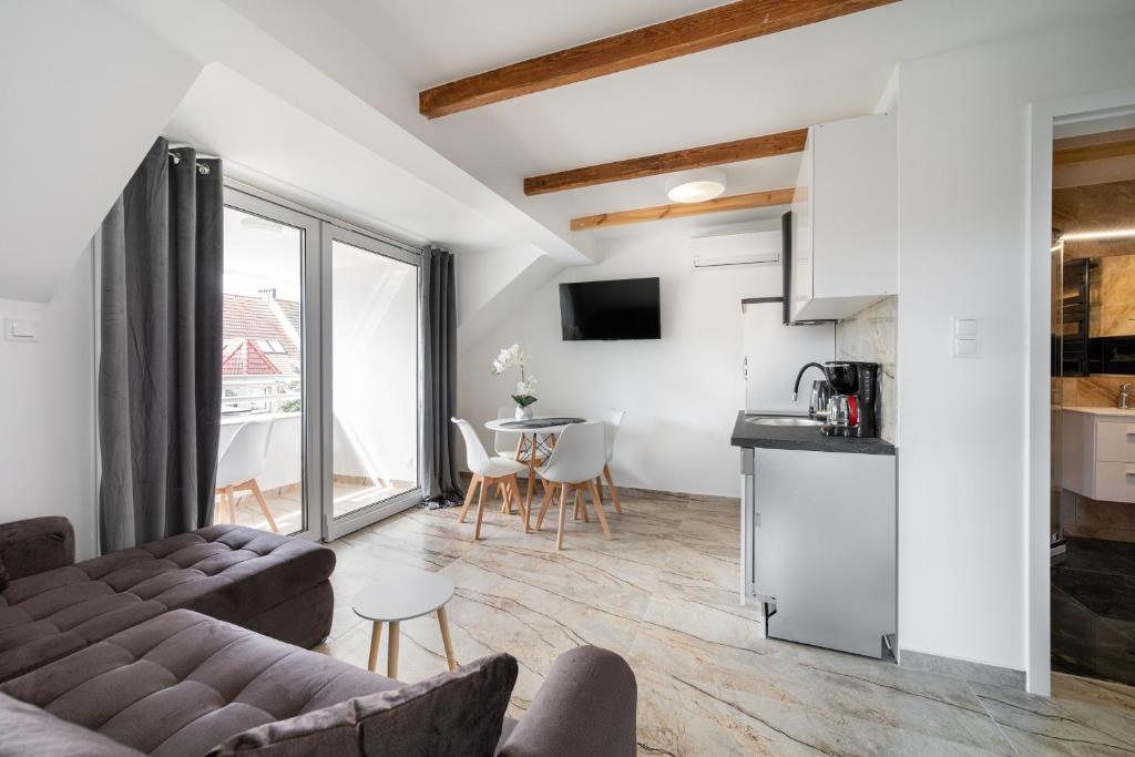 Η κουζίνα ή μικρή κουζίνα στο Apartament Dom Goscinny Justyna