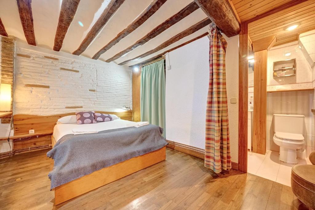 Postel nebo postele na pokoji v ubytování Casa Ana Mari II by Clabao