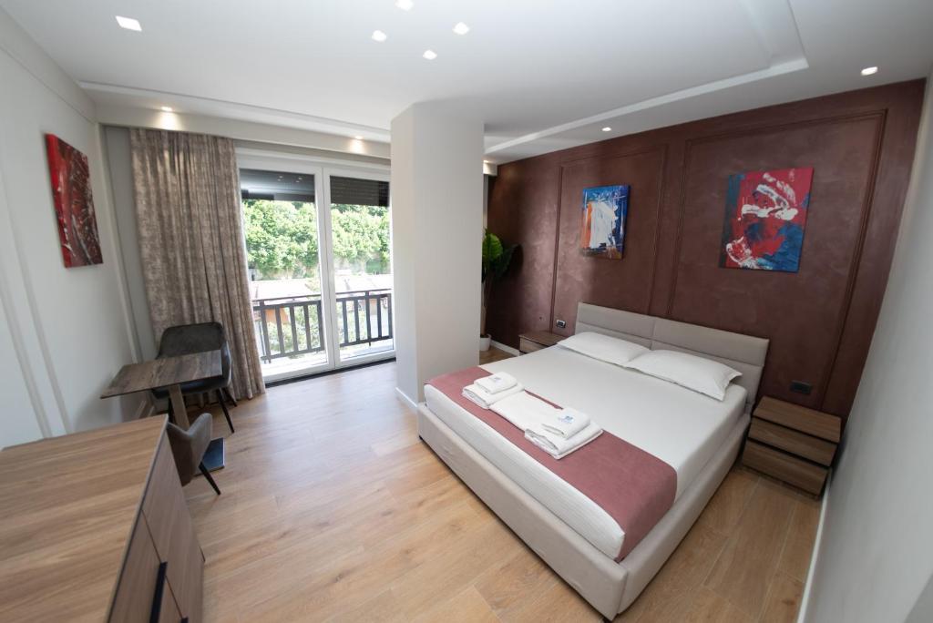 Postel nebo postele na pokoji v ubytování Hotel Monopoly