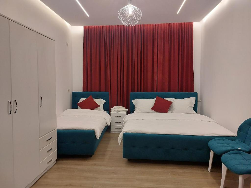Postel nebo postele na pokoji v ubytování GRAND HOTEL eae