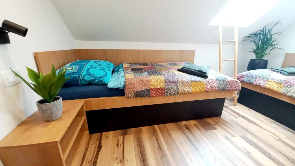 Postel nebo postele na pokoji v ubytování Apartma Rožle
