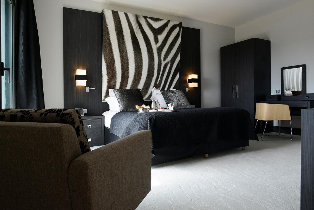 Posezení v ubytování Kyriad Prestige Lyon Est - Saint Priest Eurexpo Hotel and SPA