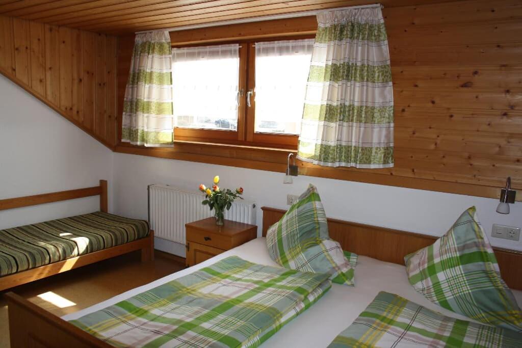 Postel nebo postele na pokoji v ubytování Haus Resi