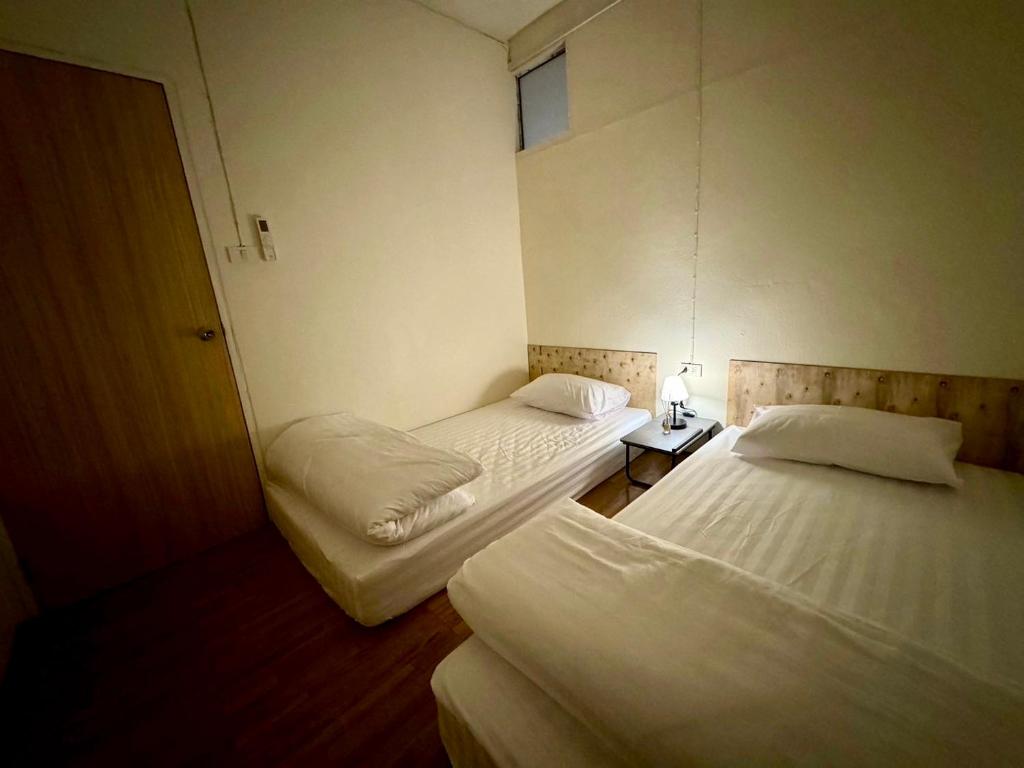Postel nebo postele na pokoji v ubytování The Lab Sleep Hostel