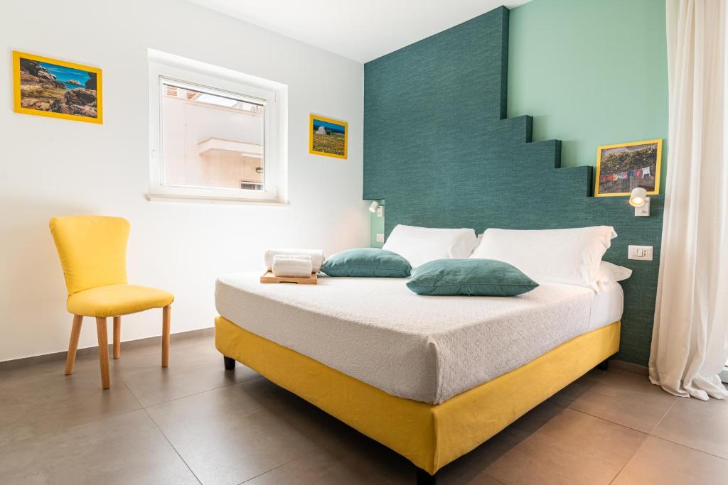 Postel nebo postele na pokoji v ubytování Verdeaqua Rooms