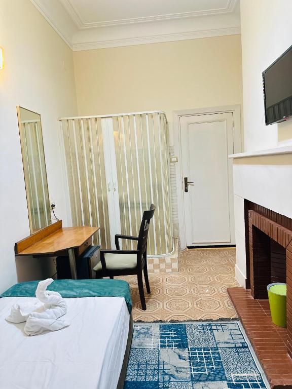 Postel nebo postele na pokoji v ubytování Zoser hostel