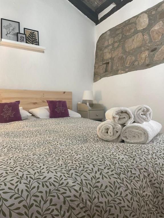 Posteľ alebo postele v izbe v ubytovaní La casa vieja de Marchenilla