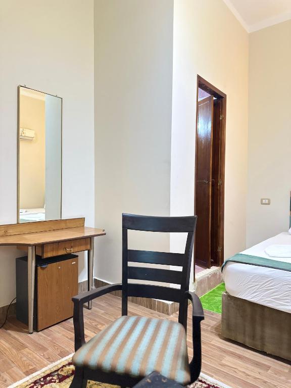 Postel nebo postele na pokoji v ubytování Zoser hostel