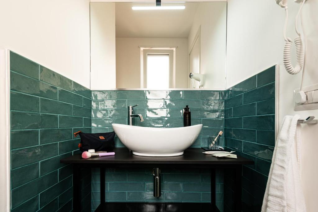 Koupelna v ubytování Verdeaqua Rooms