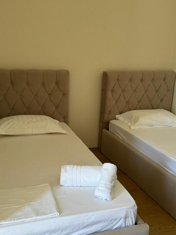 Postel nebo postele na pokoji v ubytování Grand Park Hotel