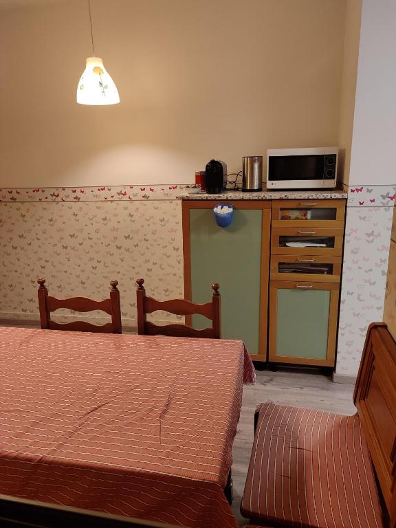 Postel nebo postele na pokoji v ubytování Al Nido