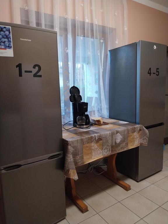 Kuchyň nebo kuchyňský kout v ubytování Fenyves Vendégház - Siófok