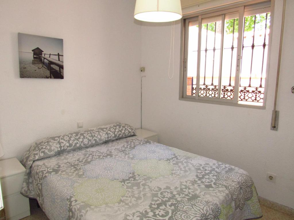 Postel nebo postele na pokoji v ubytování Pueblo Mar - Guadalmar