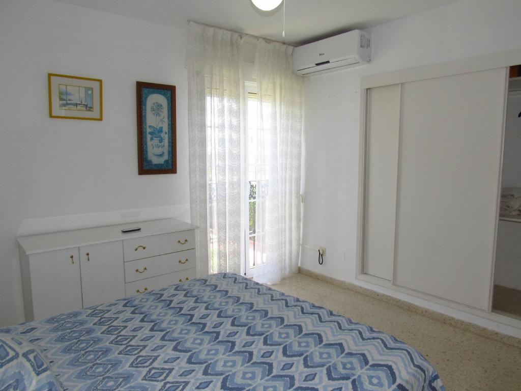 Postel nebo postele na pokoji v ubytování Pueblo Mar - Guadalmar