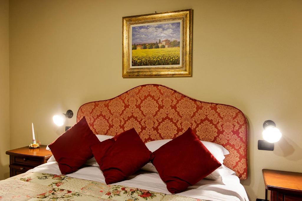 Łóżko lub łóżka w pokoju w obiekcie Casa Vacanze La Fiorita