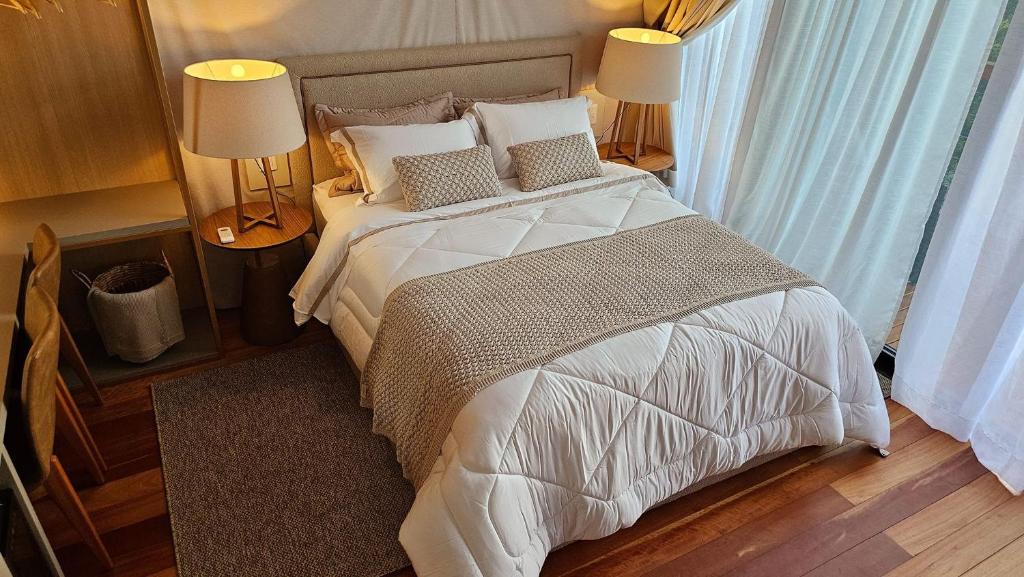 Postel nebo postele na pokoji v ubytování Cabana Urbana Village Planalto