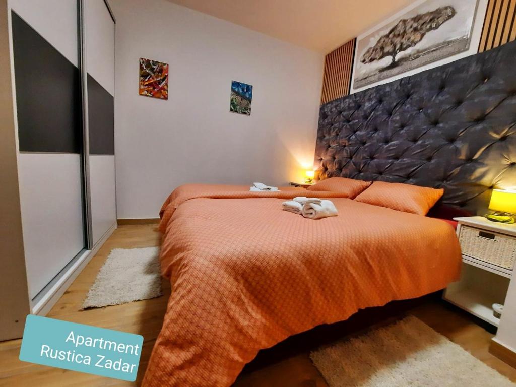 Posteľ alebo postele v izbe v ubytovaní Apartment Rustica Zadar