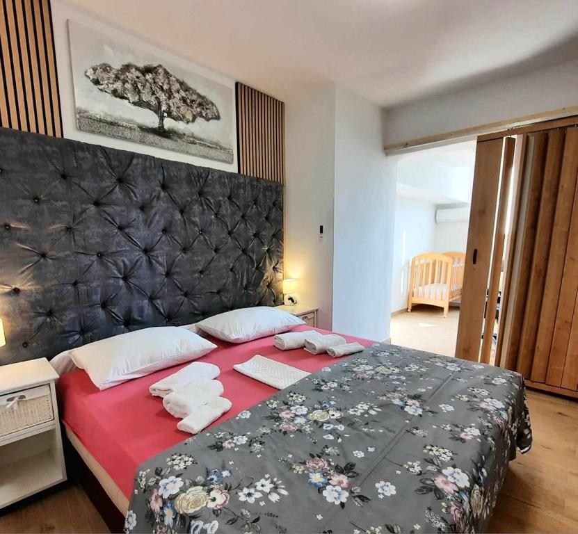 Posteľ alebo postele v izbe v ubytovaní Apartment Rustica Zadar