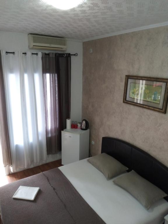 Postel nebo postele na pokoji v ubytování Room Rada