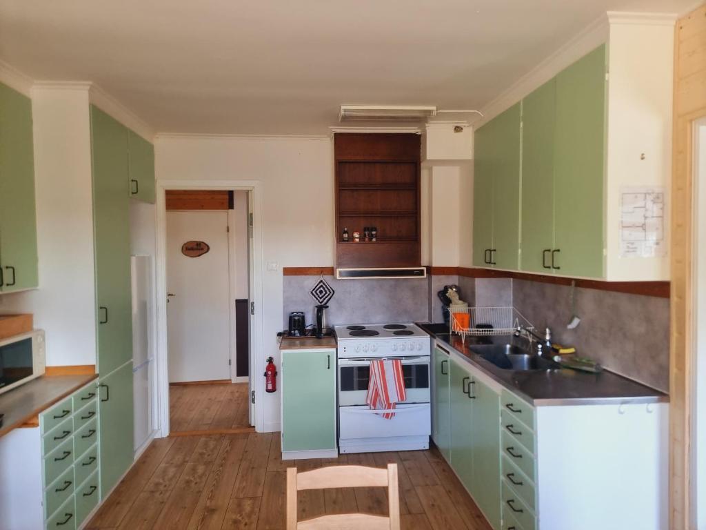 Kuchyň nebo kuchyňský kout v ubytování Elch Zimmer Wilderness Life