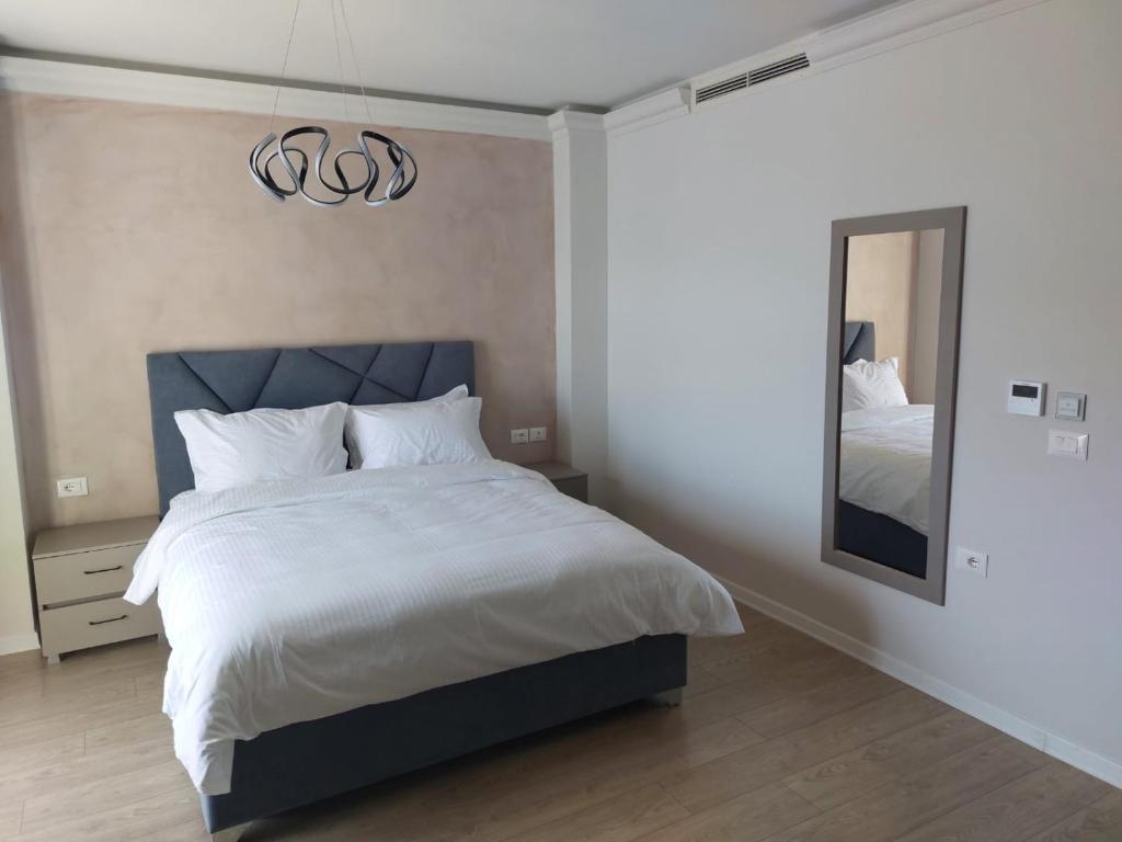 Postel nebo postele na pokoji v ubytování Hotel DEMOLI