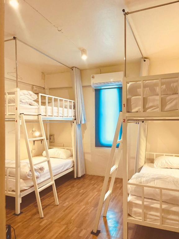 Postel nebo postele na pokoji v ubytování The Lab Sleep Hostel