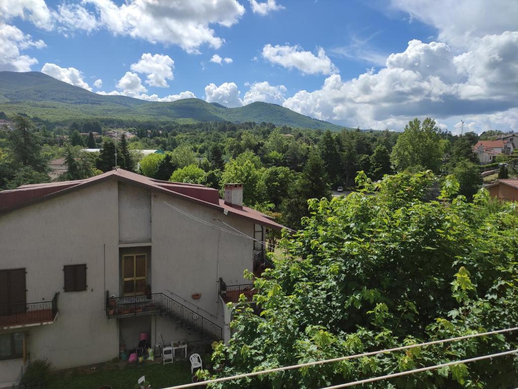 a house with a view of the mountains at CASA MARIA Castel del Piano appartamento vista montagna in zona centrale in Castel del Piano