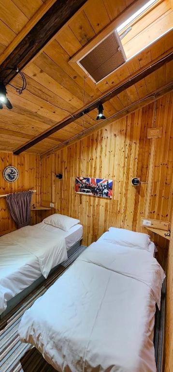 Postel nebo postele na pokoji v ubytování Hotel London