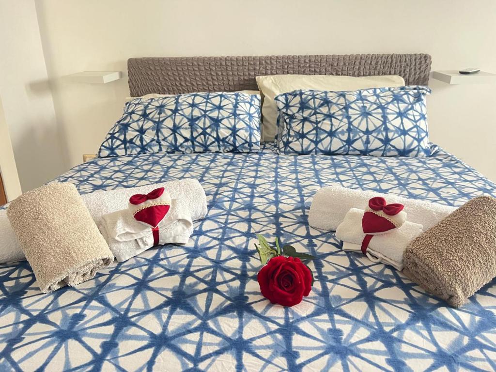 A bed or beds in a room at Tramonti In Santa Marinella