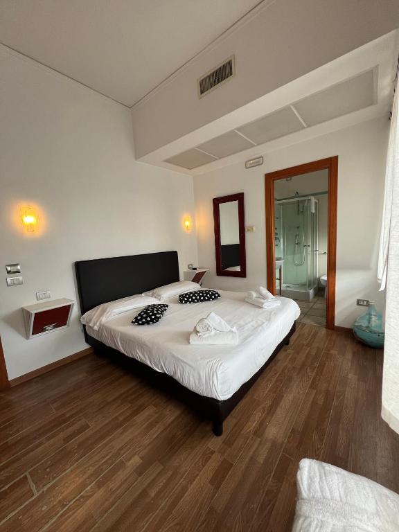 Postel nebo postele na pokoji v ubytování Millennium Gold Hotel