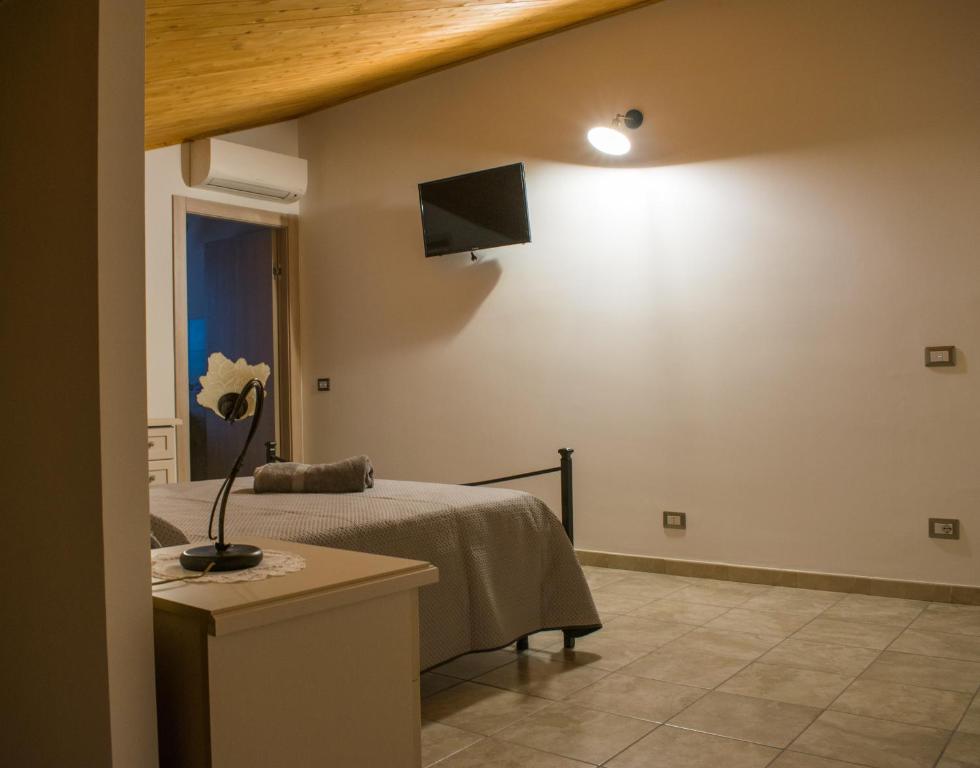TV a/nebo společenská místnost v ubytování Casa Genisi