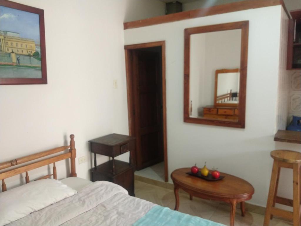 Postel nebo postele na pokoji v ubytování Casa Larimar