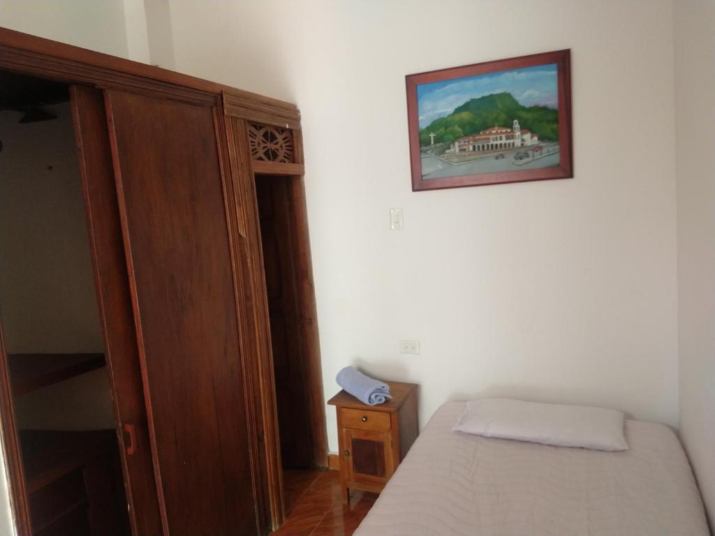 Postel nebo postele na pokoji v ubytování Casa Larimar
