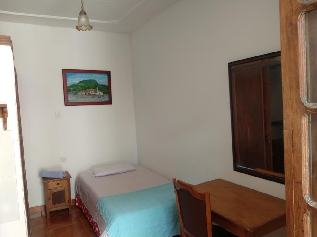 Postel nebo postele na pokoji v ubytování Casa Larimar