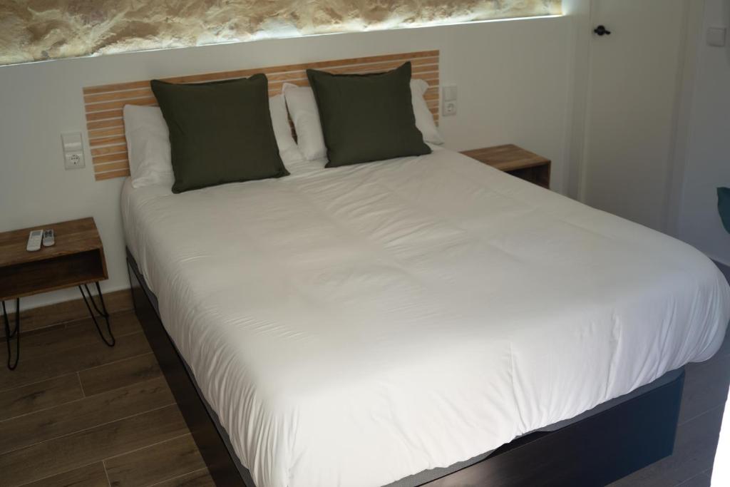 Postel nebo postele na pokoji v ubytování Hotel Boutique - Estancia dos Olivos