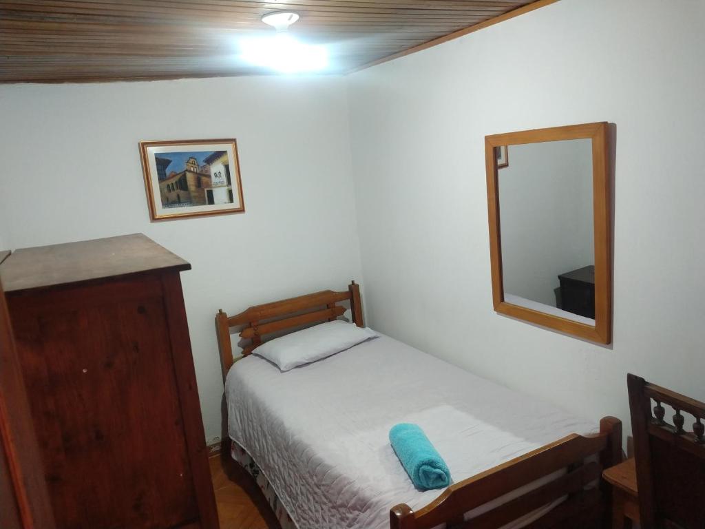 Postel nebo postele na pokoji v ubytování Casa Larimar
