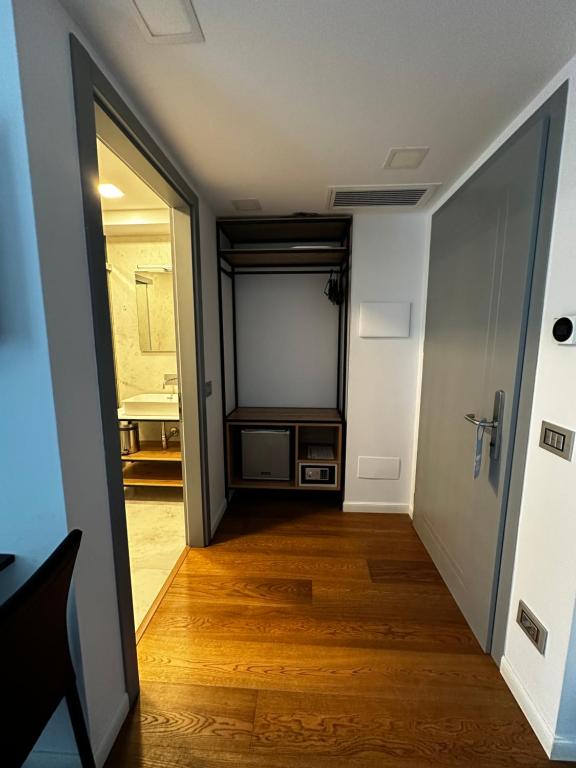 TV a/nebo společenská místnost v ubytování GRANDI 32 Boutique Residence