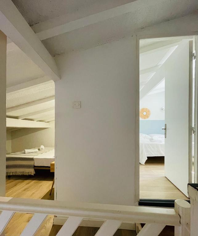 Postel nebo postele na pokoji v ubytování Propriété Malva appartement margherita