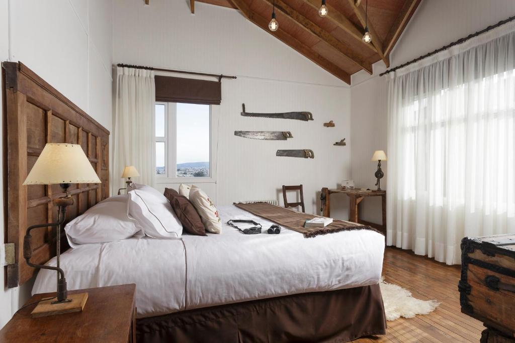 Postel nebo postele na pokoji v ubytování Hotel Boutique La Yegua Loca