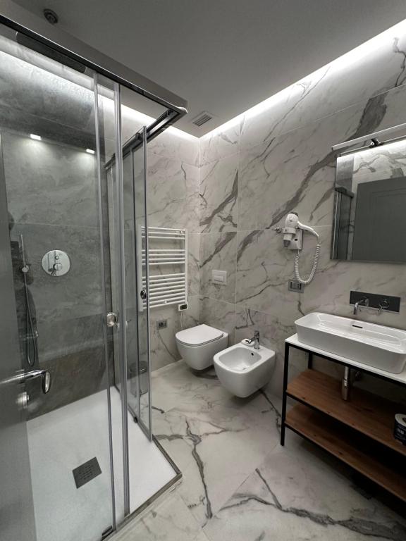 Koupelna v ubytování GRANDI 32 Boutique Residence