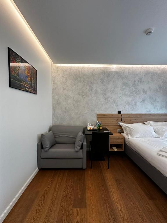 Postel nebo postele na pokoji v ubytování GRANDI 32 Boutique Residence
