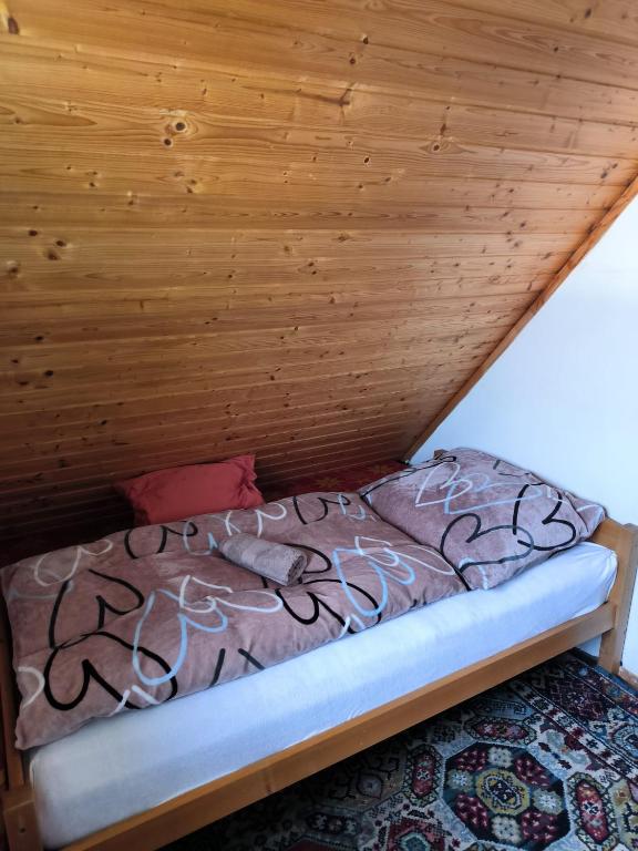 Postel nebo postele na pokoji v ubytování Chata Rybná 18