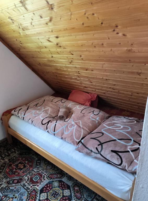 Postel nebo postele na pokoji v ubytování Chata Rybná 18