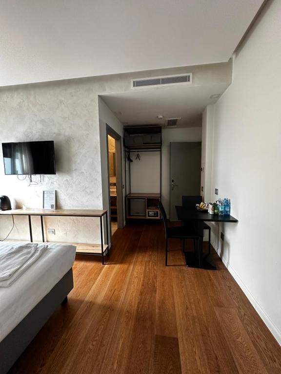 Postel nebo postele na pokoji v ubytování GRANDI 32 Boutique Residence